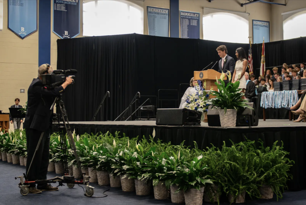 MAKE IT A GREAT DAY BUCS: Blake Miller and Lakshmi Guthikonda deliver their last speech as presidents. 